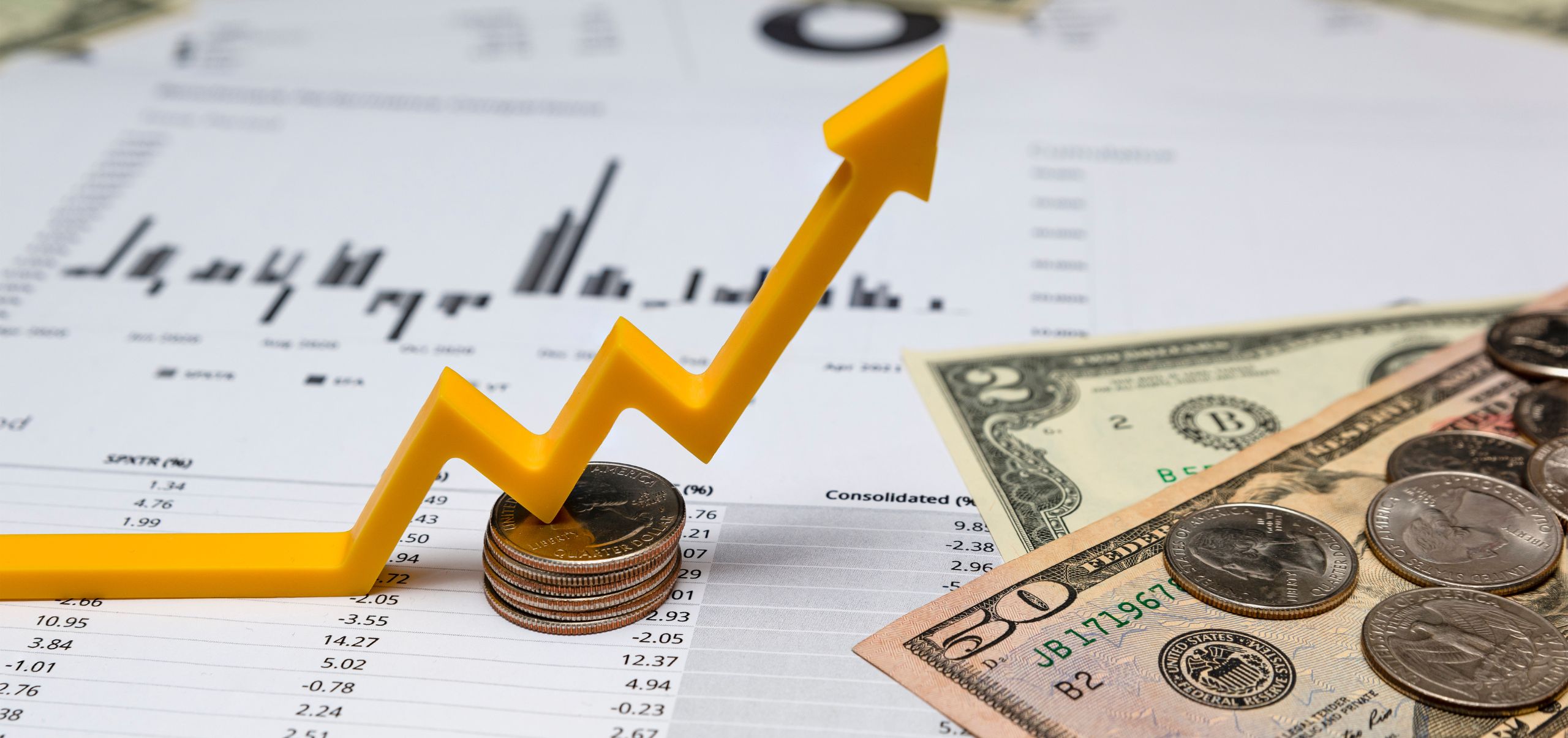 Multiple papers with data, topped by a 3D trend line and coins, illustrating financial tracking and growth for a side business